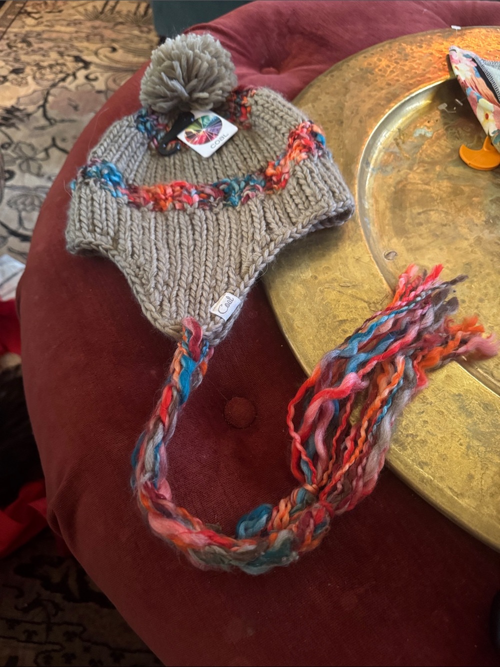 Cozy Taupe Earflap Pom Hat with Multicolor Accents